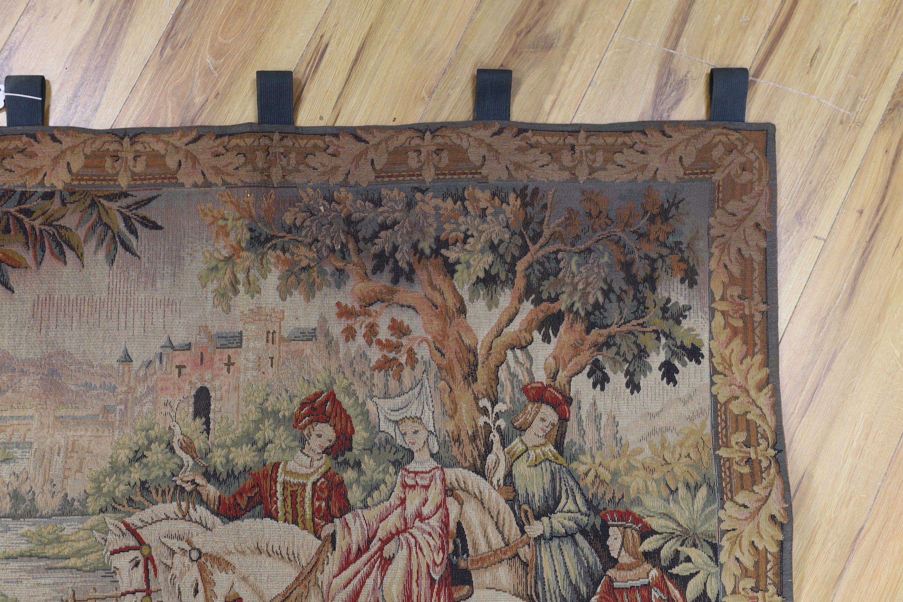 A machine tapestry panel of a Medieval figurative scene, 115cm wide, 91cm (not including hanging loops)